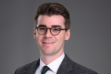 Sundholm Presents Article Widely